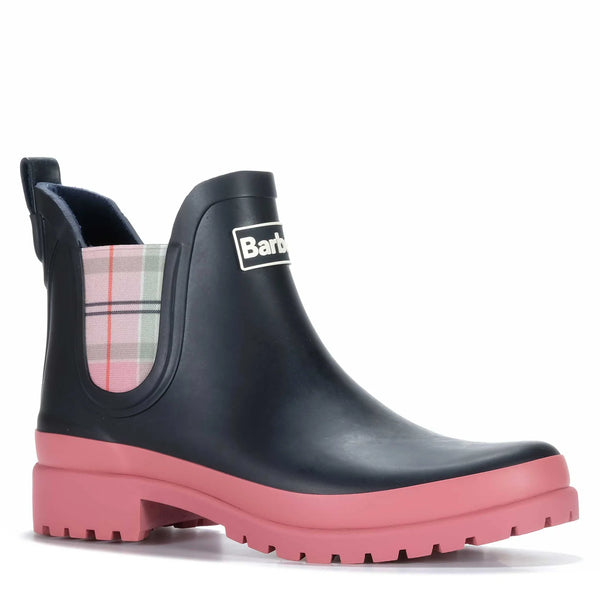 Black rain boot with pink sole on a white background