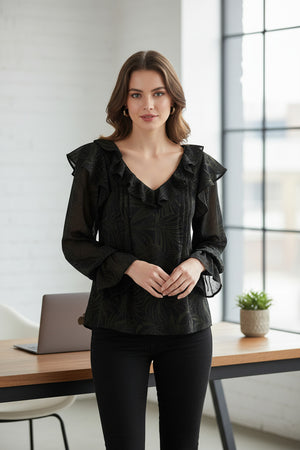 Black blouse with ruffled sleeves on a white background
